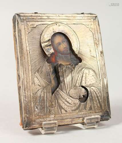 A SMALL 18TH CENTURY RUSSIAN ICON, with silver cover. Maker: B.C. 1875 (AF). 3.5ins x 3ins.