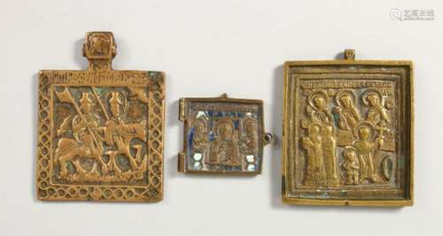 THREE SMALL BRASS ICONS. 2ins x 2ins and 1.5ins x 1.5ins.