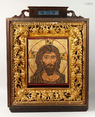 A LARGE 19TH CENTURY MOSAIC PORTRAIT, Head of Christ, 15ins x 13ins, in a 19th century Italian