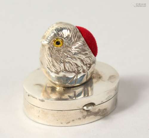 A SILVER CHICK PIN CUSHION AND PILL BOX COMBINED.
