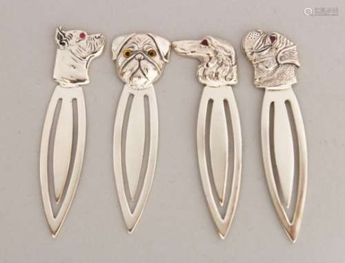 A SET OF FOUR SILVER DOGS HEAD BOOK MARKERS.