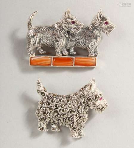 TWO NOVELTY SILVER SCOTTIE DOG BROOCHES.