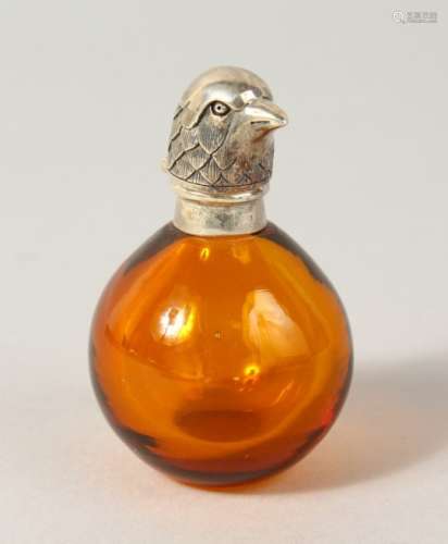 A SMALL SILVER TOP BIRD GLASS SCENT BOTTLE.