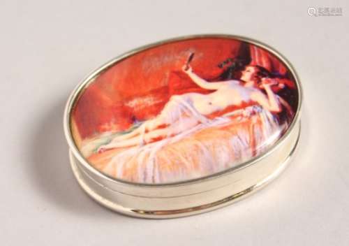AN OVAL SILVER PILL BOX, with oval enamel of a nude.