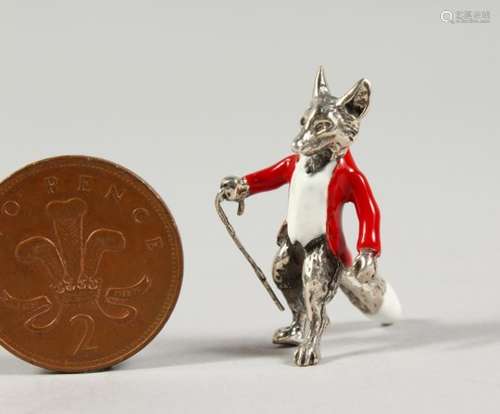 A MINIATURE SILVER AND ENAMEL FIGURE OF A FOX. 1.25ins high.