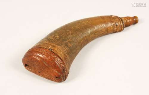 AN 18TH CENTURY/19TH CENTURY CARVED HORN POWDER FLASK, with carved wood base depicting a rabbit.