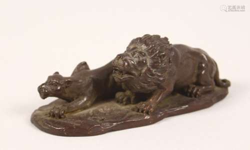 A SMALL JAPANESE BRONZE GROUP, of a lion and lioness. 4ins long.