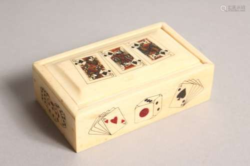 A BONE GAMING BOX, containing dice. 3.5ins long.