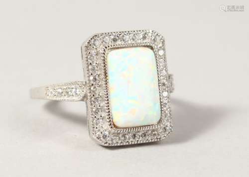 A SILVER GILSON OPAL RING.