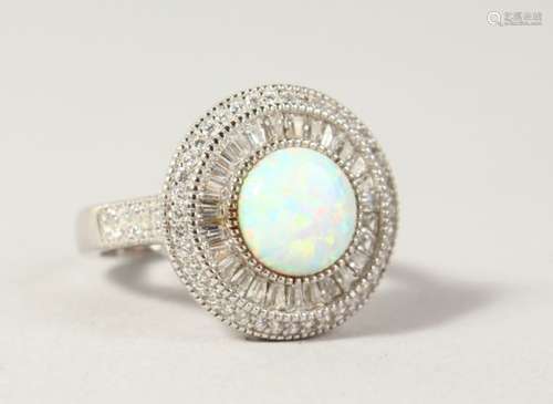 A GILSON OPAL AND CZ ROUND SET RING.