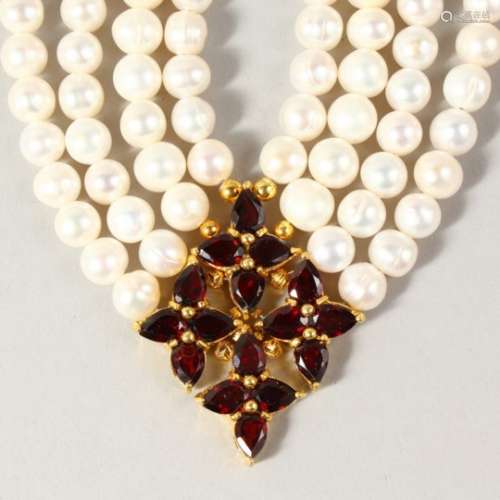 A FOUR ROW PEARL, SILVER AND GOLD PLATED NECKLACE.