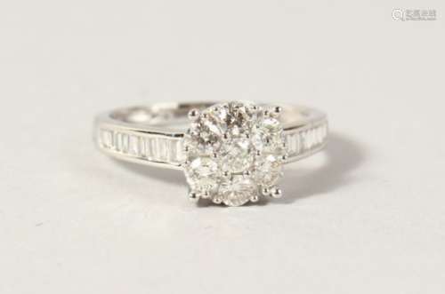 A GOOD 18CT DIAMOND ROUND CLUSTER RING.