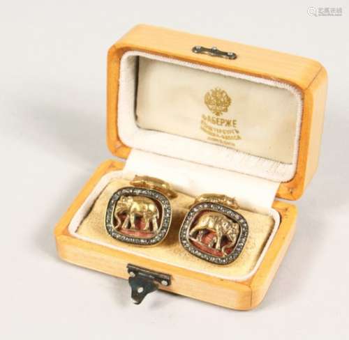 A VERY GOOD PAIR OF RUSSIAN YELLOW GOLD, ENAMEL AND DIAMOND CUFFLINKS, mounted with elephants,
