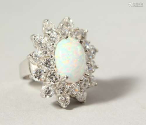 A LARGE SILVER, GILSON OPAL AND BRILLIANT COCKTAIL RING.