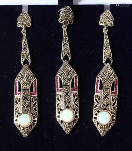 AN ART DECO DESIGN SILVER, OPAL AND RUBY PENDANT AND EARRINGS.