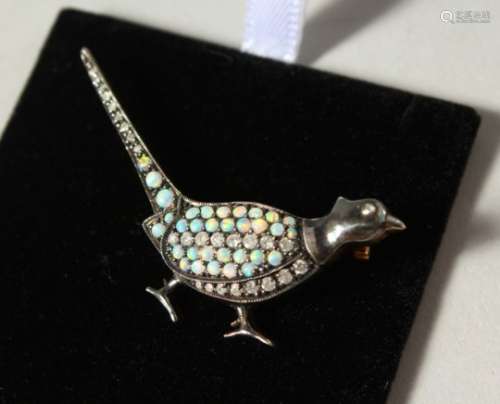 A SILVER AND GOLD, OPAL AND DIAMOND PHEASANT BROOCH.