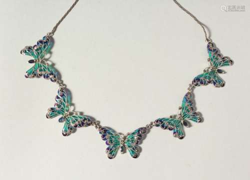 A SILVER, SAPPHIRE AND MARCASITE BUTTERFLY NECKLACE.