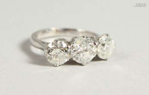 A VERY GOOD 18CT WHITE GOLD THREE-STONE DIAMOND RING of 3.22CTS.