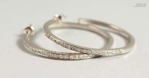 A PAIR OF 18CT WHITE GOLD DIAMOND HOOP EARRINGS.