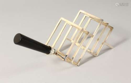 A CHRISTOPHER DRESSER STYLE TOAST RACK.