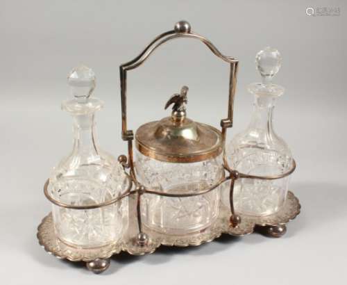 AN UNUSUAL COMBINATION BISCUIT BARREL AND DOUBLE DECANTER STAND, with cut glass biscuit barrel and