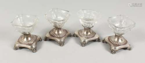 FOUR CONTINENTAL SILVER AND CUT GLASS SALTS. 3.25ins high.
