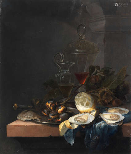 Circle of Jacob van Walscapelle(Dordrecht 1644-1727 Amsterdam) Oysters, chestnuts, glasses of wine and a peeled lemon on a cloth draped table-top unframed