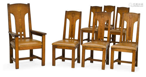 Set of Seven Dining Chairs1905-1910inlaid oak, upholstered, tagged with maker's label height of side chairs 42 3/4in (108.5cm); width 19 1/2in (49.5cm); depth 19in (48.2cm); height of armchair 48in (121.9cm); width 26in (66cm); depth 24in (60.9cm)  Shop of the Crafters