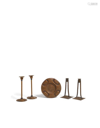 Group of Five Table Objectscirca 1905hammered copper, comprising a pair of Roycroft candlesticks, a pair of Karl Kipp Princess candlesticks, and ashtray, each with their respective maker's marksheights 7in and 8in (17.7cm and 20.3cm); widths 3 1/4in and 3 1/2in (8.2cm and 8.8cm); diameter of ashtray 7in (17.7cm)  American Arts and Crafts