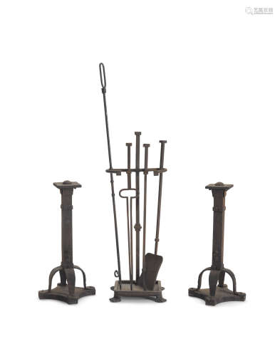 Set of Firetoolsearly 20th centurywrought iron, comprising a pair of andirons, poker, spade, tongs and an unassociated poker, on stand, unmarkedheight of andirons 24in (60.9cm); width 7in (17.7cm); depth 7in (17.7cm)  American Arts and Crafts