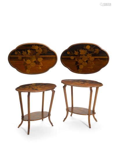 Companion Pair of Two-Tier Side Tables circa 1900marquetry walnut and mahogany, each signed in marquetry 'Gallé'height 30 1/2in (77.4cm); width 31 3/4in (80.6cm); depth 20 1/4in (51.4cm)  Émile Gallé (1846-1904)