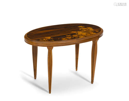 Oval Occasional Tablecirca 1900marquetry macassar ebony and walnut, inlaid 'Gallé'height 18in (45.7cm); width 27 1/4in (69.2cm); depth 15 3/4in (40cm)  Émile Gallé (1846-1904)