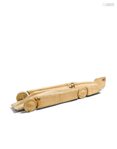 Model of an Auburn Racing Car with Driversecond quarter 20th centuryenameled metal, tires stamped 'CORD RACING MADE IN ENGLAND 35x6.00'height 4 1/4in (11cm); length 33in (84cm); width 7in (18cm)  Modernist