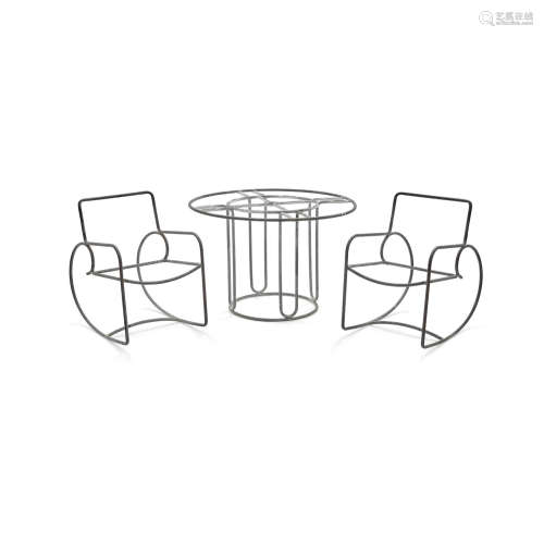 Group of Outdoor Furnituremid 20th centuryfor Brown Jordan, bronze tubing, comprising: round dining table and a pair of rockersheight of table 28in (71.1cm); diameter 42 1/2in (107.9cm); height of chairs 31 3/4in (80.6cm); width 21 1/4in (53.9cm); depth 31 3/4in (80.6cm)  Walter Lamb (American)