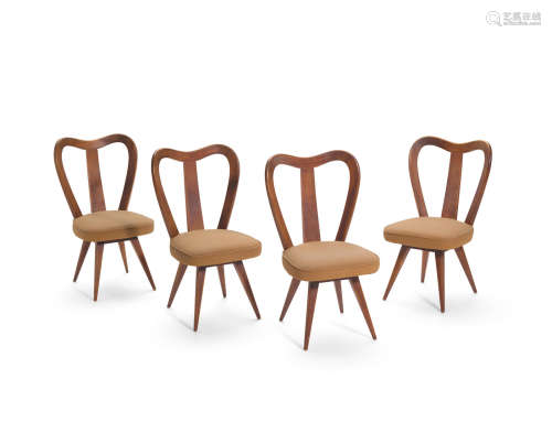 Set of Four Spoon Back Chairs1950walnut, cotton, polyfoam, three chairs with manufacturer's label 'Kagan-Dreyfuss Inc' height 36 1/2in (92.7cm); width 21in (53.3cm); depth 19in (48.2cm)  Vladimir Kagan (1927-2016)