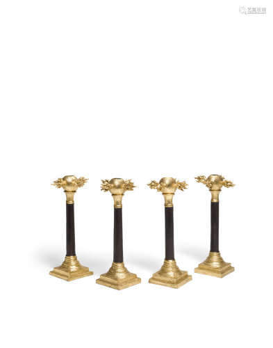 Set of Four Flared Columnar Candlesticks1990sfor David Gill, painted and gilt decorated ceramic, stamped on underside 'H David Gill London'height of each 12 3/4in (32.4cm)  Oriel Harwood (20th Century)