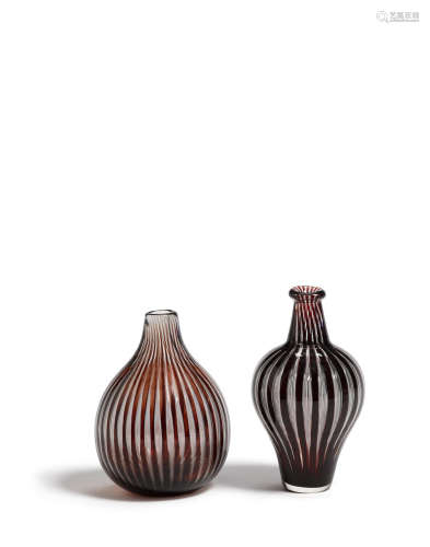 Group of Two Ariel Vasescirca 1950sglass, smaller vase inscribed 'ORREFORS Ariel nrs 96F Edwin Ohrstrom', larger vase inscribed 'ORREFORS Soredon Ariel no. 1833D Edwin Öhrström'heights 7 1/4 and 8in (18.4 and 20.3cm); widths 4 1/4 and 5in (10.7 and 12.7cm); depths 4 and 4 1/4in (10.1 and 10.7cm)  Edvin Öhrström (1906-1994)