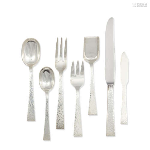 Starlit Pattern Silver Servicecirca 1950sterling silver, with fitted wood box comprising 18 knives, 18 large spoons, 19 tea spoons, 18 dinner forks, 17 salad forks, 12 butter knives, 1 sugar scoop, total weighable silver approximately 139oz troy (103), stamped 'ALLAN ADLER 0 HANDHAMMERED STERLING'  Allan Adler (1916-2002)