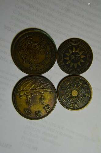 four Chinese old copper coins.