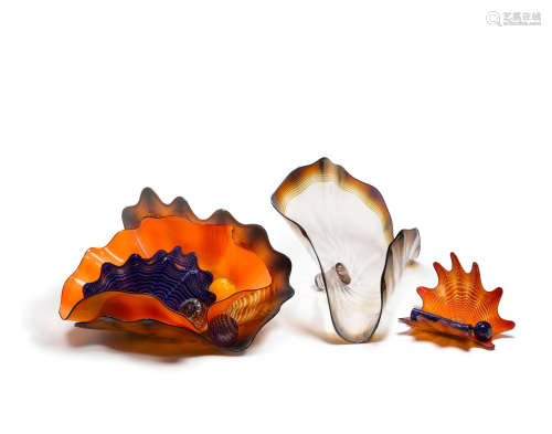 Group of Ten Seaform Persians1988 - 1998blown glass, largest element signed 'Chihuly 1989', orange persian with black lip wrap signed 'Chihuly 1988' (10)height of largest element 19in (48.2cm); width 34 1/4in (86.9cm); depth 15 1/4in (38.7cm)  Dale Chihuly (born 1941)