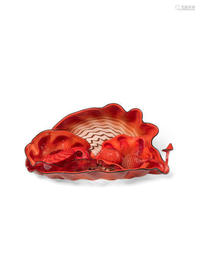 Seven Piece Carnelian Red Seaform Set1995blown glass, incised 'Chihuly 95' on one elementheight 10 3/4in (27.3cm); width 23 1/4in (59.1cm); depth 13in (33cm)  Dale Chihuly (born 1941)