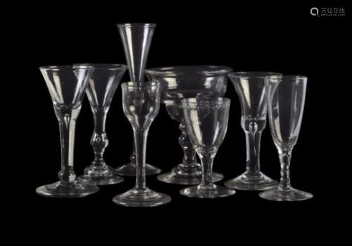 Seven assorted plain stemmed and baluster wine glasses
