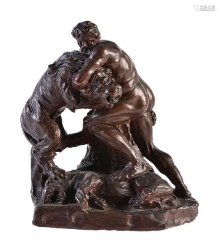 A Netherlandish stained terracotta group of Hercules wrestling the Nemean lion