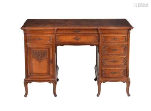 A Continental walnut and figured walnut kneehole desk