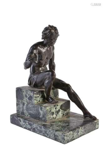 A Continental patinated bronze model of a seated poet or playwright in Antique taste