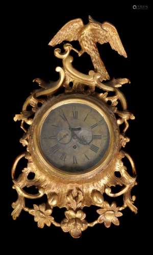 A giltwood cartel timepiece
