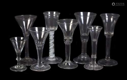 Five various plain-stemmed wine glasses