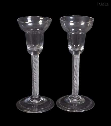 A pair of pan-topped air-twist wine glasses