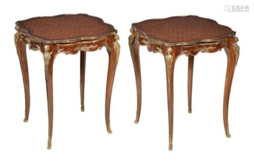 A pair of mahogany, parquetry inlaid, and gilt metal mounted side tables