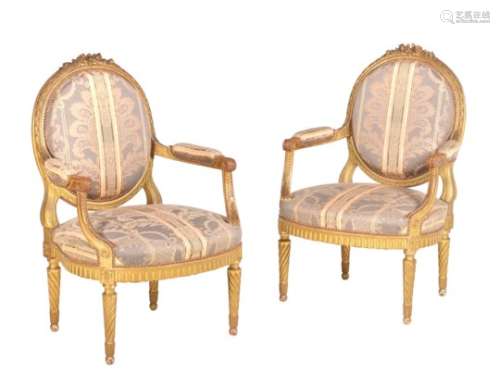 A suite of giltwood and upholstered seat furniture in Louis XVI style